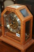 AN UNUSUAL CONTEMPORARY WALNUT CASED CHIMING MANTLE CLOCK SIGNED KIENINGER
