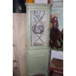 A PAIR OF PAINT DECORATED CORNER CABINETS WITH ASTRAGAL GLAZING