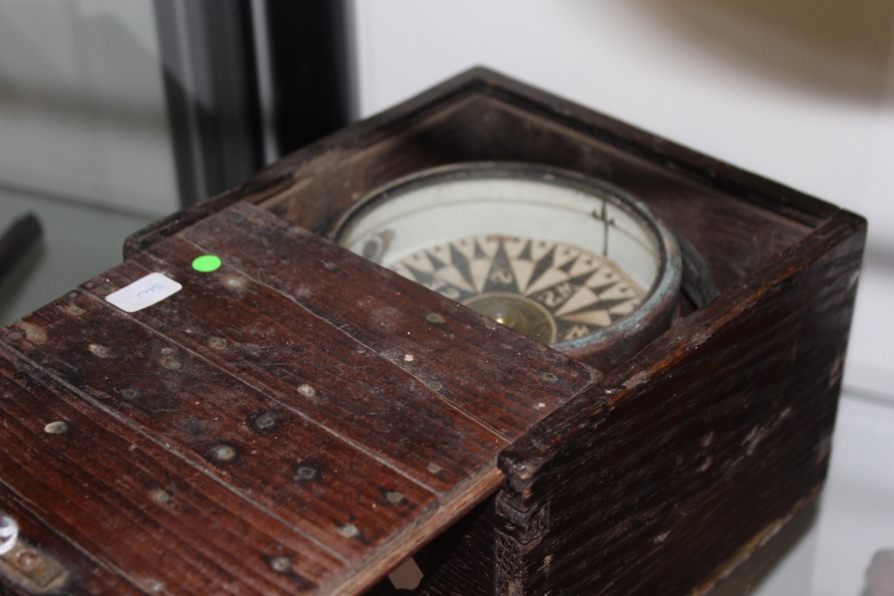 A 19TH.C.MARINE COMPASS IN A WOODEN CASE WITH GIMBALLED FITTING. BY THE KING'S PATENT....?