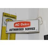 A VINTAGE AC DELCO ILLUMINATING SIGN