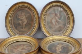 After F. Bartolozzi, four small oval colour prints of putti, in gilt frames.