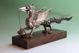 The Welsh Dragon trophy table lighter, c.1937 by Walker and Hall, inscribed Ye Dragon of Wantley,