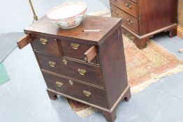 A 19th Century mahogany batchelor's chest, with folding top above two short and two long graduated