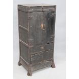 An interesting antique Japanese provincial lacquered and iron bound small cabinet, possibly a