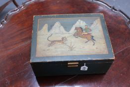 A Russian painted box, decorated with horseman and Siberian tiger in a mountain landscape, 23 x