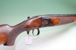 A Winchester 101 double barrelled 12bore over and under shotgun, 30inch barrels, border and scroll