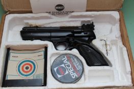 A Webley Tempest .22 air pistol contained in original box with target holder