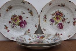 A pair of antique Meissen floral decorated plates, diameter 24.5cm, and another pair with figural