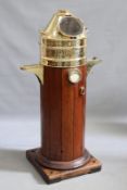 An early 20th Century teak and brass ships binnacle, fitted with gimbal compass and complete with