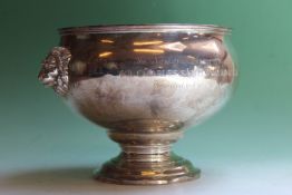 A silver rose bowl with stylized lion mask side handles, Chester 1909  (later engraving), 26ozs