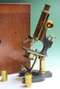 A late 19th/early 20th Century lacquered brass monocular microscope by W. Watson and Sons, High