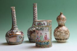 A pair of Cantonese famille verte small bottle vases, 16cm high, a similar pierced cylindrical brush