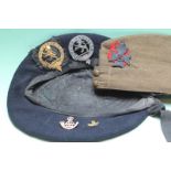 A King's Royal Rifles military cap and beret, with gilt and white metal badges, together with a gold