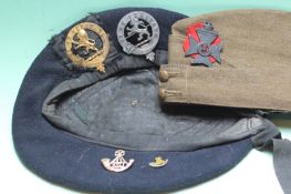 A King's Royal Rifles military cap and beret, with gilt and white metal badges, together with a gold