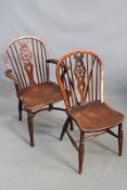 An early 19th Century country yew wood and elm wheelback open armchair, together with a similar side