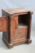 An early 19th Century mahogany pedestal cabinet, with sliding door over cellarette drawer