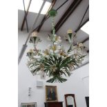 A pair of Continental polychrome tole six light "lily" chandeliers, 60cm high x 55cm diameter