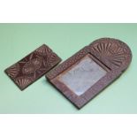 Treen: an early 18th Century chip carved decorated hand mirror, with sliding cover