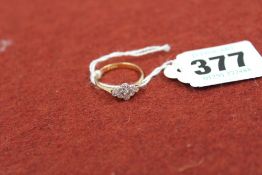 An 18ct gold and platinum all diamond dress ring