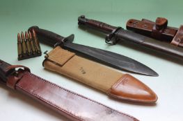 An American Remington 1917 pattern bayonet, together with a military type machete in leather