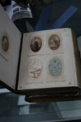 Two late Victorian leather bound photograph albums, containing portraits in decorative mounts.