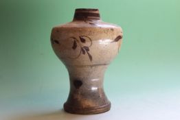 A Far Eastern baluster pottery vase, probably of Korean origin, 20cm high