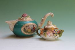 A late 19th Century Meissen miniature teapot encrusted with flowers, 5cm high  and another Meissen