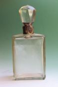 A rectgangular glass decanter with silver lock and collar, dated Birmingham 1928, Hukin & Heath,