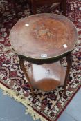 A French parquetry inlaid ormolu mounted lamp table, the shaped top with conforming undertier