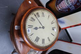 An early Victorian mahogany wall clock, the 12" painted dial with Roman numerals and cast bezel, and