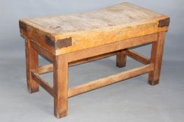 A large country house "Butchers Block", with iron bindings on a stretched pine base, 122 x 63cm