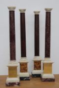 A pair of antique porphyry and white marble architectural form columns, together with a matching