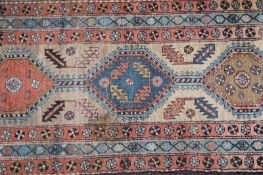 An antique Persian serab runner, Liberty, London label, 440 x 78cm