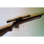 A BSA sportsman 5 .22 lr bolt action rifle, fitted with sound moderator and scope, serial number
