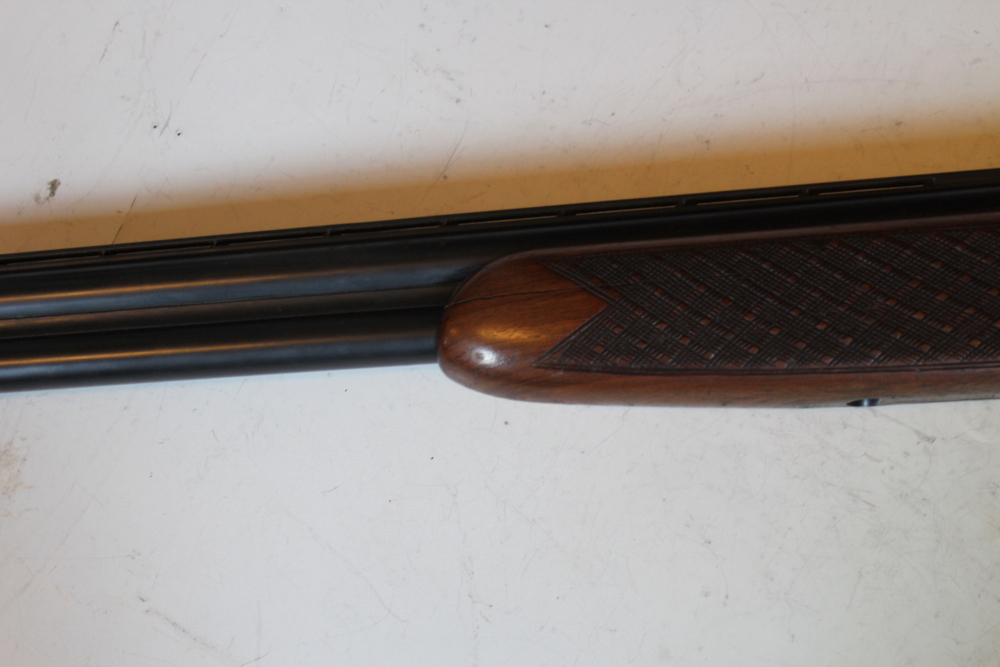 A Laurona 12-bore over and under shotgun, 26inch barrels, border and scroll engraved double - Image 6 of 11