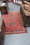 A Persian shiraz rug, 204 x 103cm, and two others