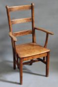 A 19th Century Arts and Crafts country ladder back armchair