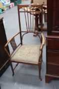 A pair of late 19th Century mahogany Arts and Crafts open armchairs