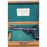 A Webley Junior .177 air pistol in fitted oak case, with Stephen Grant & Sons label
