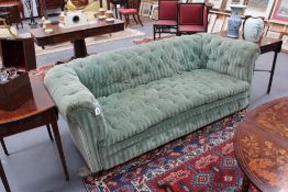 A Victorian button back Chesterfield settee, on three short turned front legs, 214cm wide x 96cm