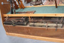 Four shotgun carrying cases to include labelled leather cases, Cogswell & Harrison, William Powell
