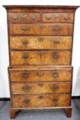 An 18th Century walnut chest on chest of two short and six long graduated drawers, with brushing