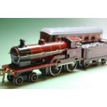 A Bassett Lowke clockwork OO gauge 4-4-0 model, George the Fifth, maroon livery with tender, 5320