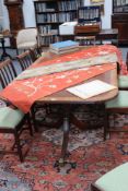 A bespoke inlaid mahogany Regency style twin pedestal dining table, the satinwood and crossbanded