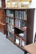 A late Victorian Arts and Crafts style oak open bookcase with adjustable shelves, 160cm wide