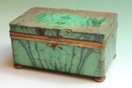 A malachite cedar lined cigarette box, with brass mounts and pad feet, 22cm x 14cm x 11cm high