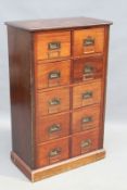 A late 19th/early 20th Century mahogany ten drawer stationery filing cabinet, with brass inset