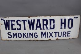 An enamel advertising sign for "Westward-ho" smoking mixture 127 x 38 cm