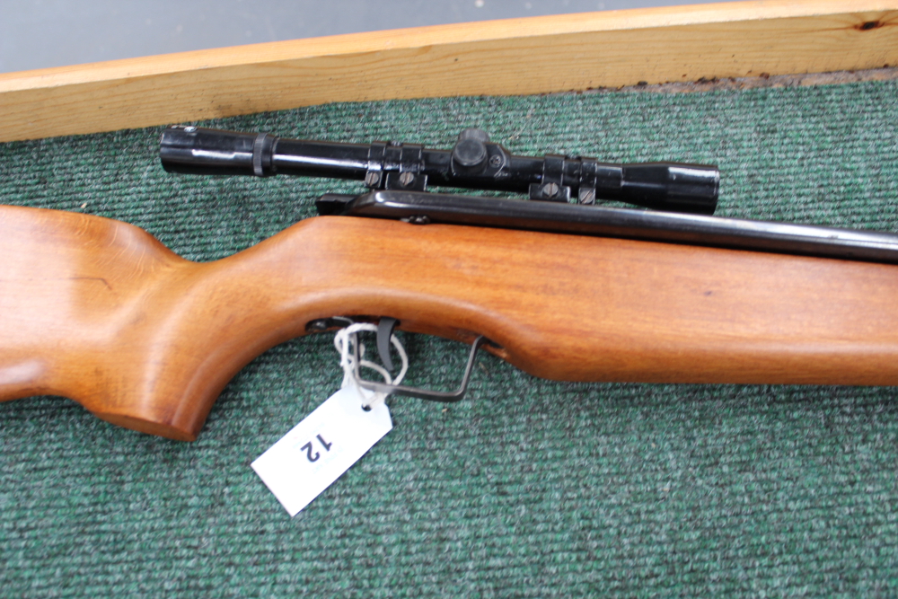 An early Sussex Armoury Jackal Woodsman .22 air rifle complete with Sussex Armoury scope