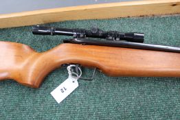 An early Sussex Armoury Jackal Woodsman .22 air rifle complete with Sussex Armoury scope